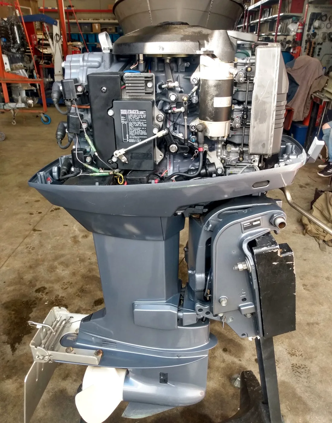 Outboard motor being serviced at Crowley Marine